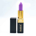Alhalal cosmetics lila läppstift i sammetstextur med guld- och svarta ärmar
